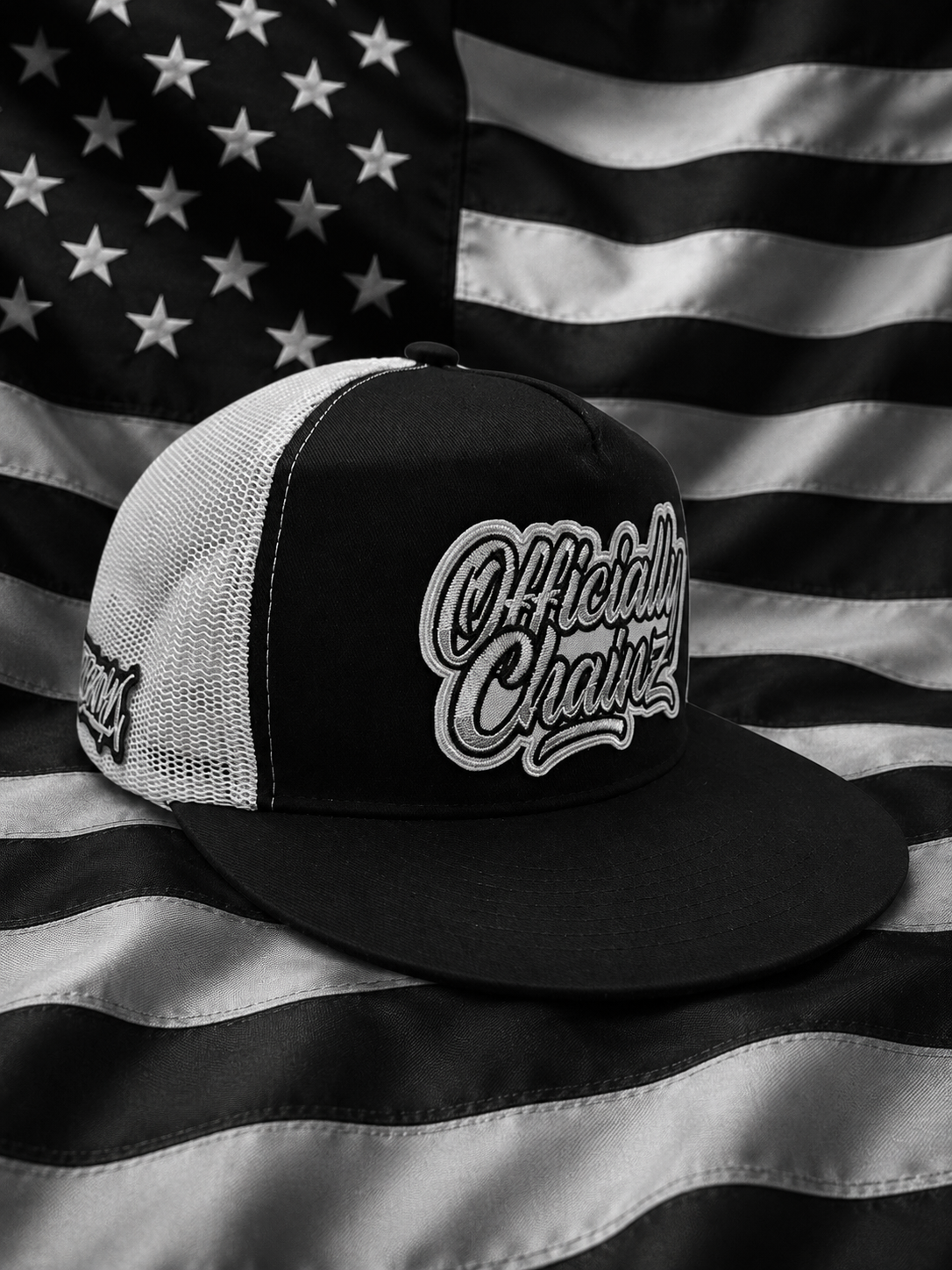 Black and white officially chain flat bill